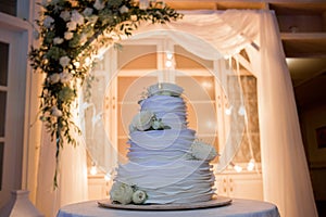 Bride and groom cut a wedding cake with a knife