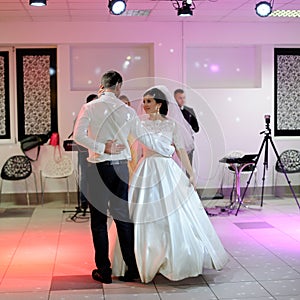 bride and groom dancing on the wedding