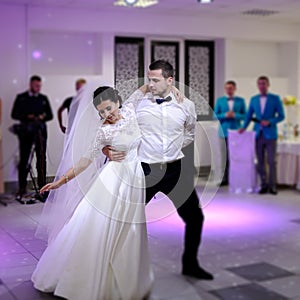 bride and groom dancing on the wedding