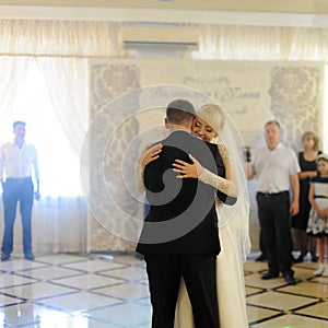 bride and groom dancing on the wedding