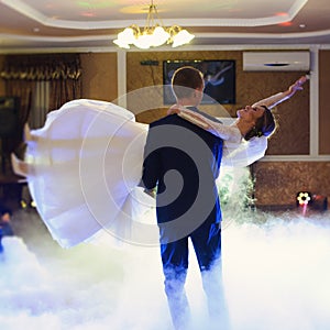 bride and groom dancing on the wedding