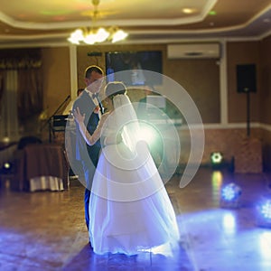 bride and groom dancing on the wedding