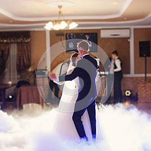 bride and groom dancing on the wedding