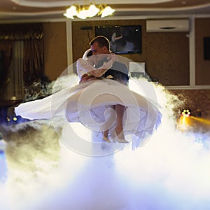 bride and groom dancing on the wedding