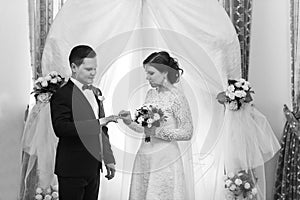 Bride and groom exchange rings