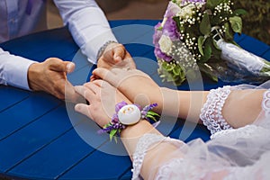 bride and groom hands close up