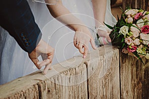 bride and groom hands