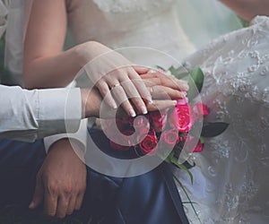 Bride and groom, hands