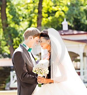 Bride and groom having a romantic moment on their