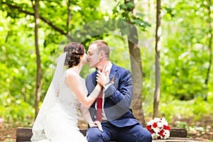 Bride and groom having a romantic moment on their wedding day