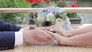Bride And Groom Hold Each Other`s Hands