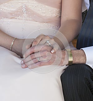 Bride and Groom Holding Hands