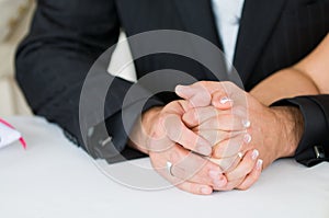 Bride and groom holding hands