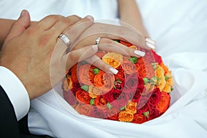 Bride and groom holding hands