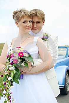 Bride and groom hugging