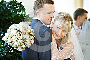 Bride and groom in interiors of marriage palace