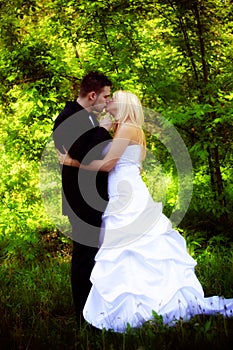 Bride and groom kiss