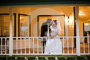 Bride and groom kiss