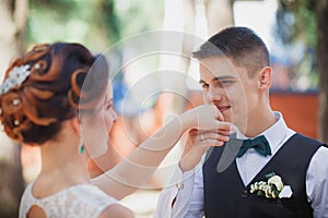 The bride and groom kiss