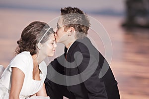 Bride and groom kissing