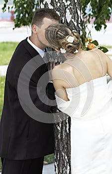 Bride and groom kissing