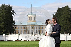 Bride and groom kissing in Arkhangelskoe