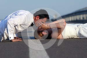 Bride and groom kissing