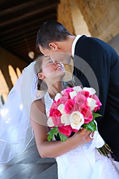 Bride and Groom Kissing at Wedding