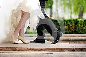bride and groom legs