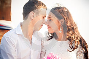 Bride and groom look into eyes