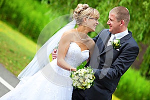 Bride and groom looking each other