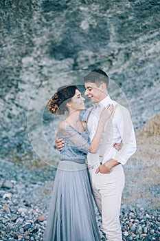 The bride and groom in nature in summer. Wedding