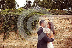 Bride and groom outdoors on their wedding day