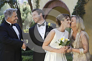 Bride And Groom With Parents