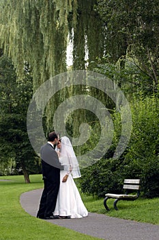 Bride and Groom in a park