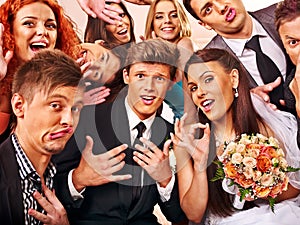 Bride and groom in photobooth.