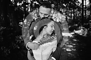 Bride and groom romantic embrace