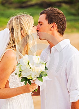 Bride and Groom, Romantic Newly Married Couple Kissing at the Be