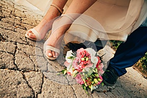 Bride and groom shoes with flowers