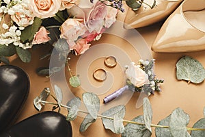 Bride and groom shoes, two gold rings