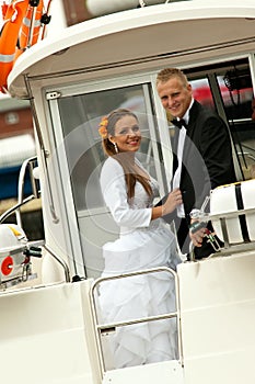Bride and groom on speedboat