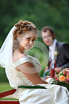 Bride and groom on swing