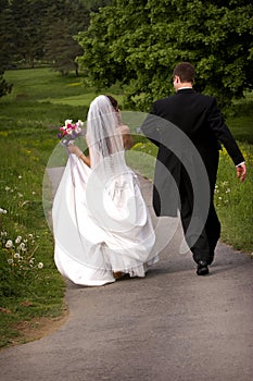 Bride and Groom walking away