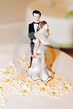 Bride and groom wedding cake decoration photo
