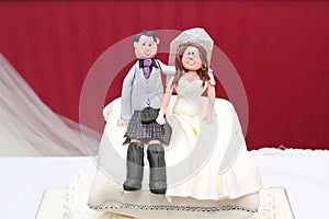 Bride and groom wedding cake topper couple