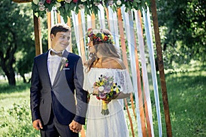 Bride and groom during wedding ceremony outdoor