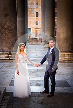 Bride and groom wedding poses in front of Pantheon, Rome, Italy