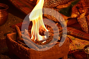 Bride Groom  wedding rituals hindu culture havan kund agni fire. photo