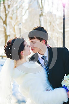 bride and groom in winter park