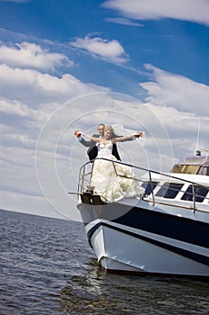 Bride and groom on a yacht